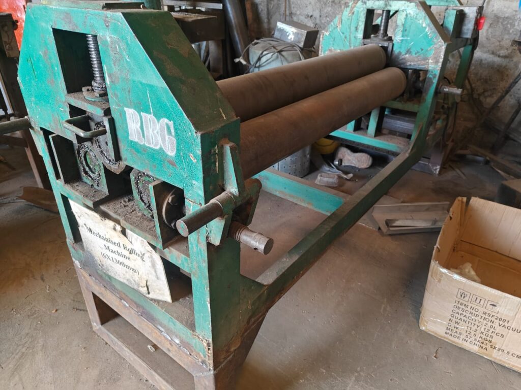Black/ stainless steel rolling machine